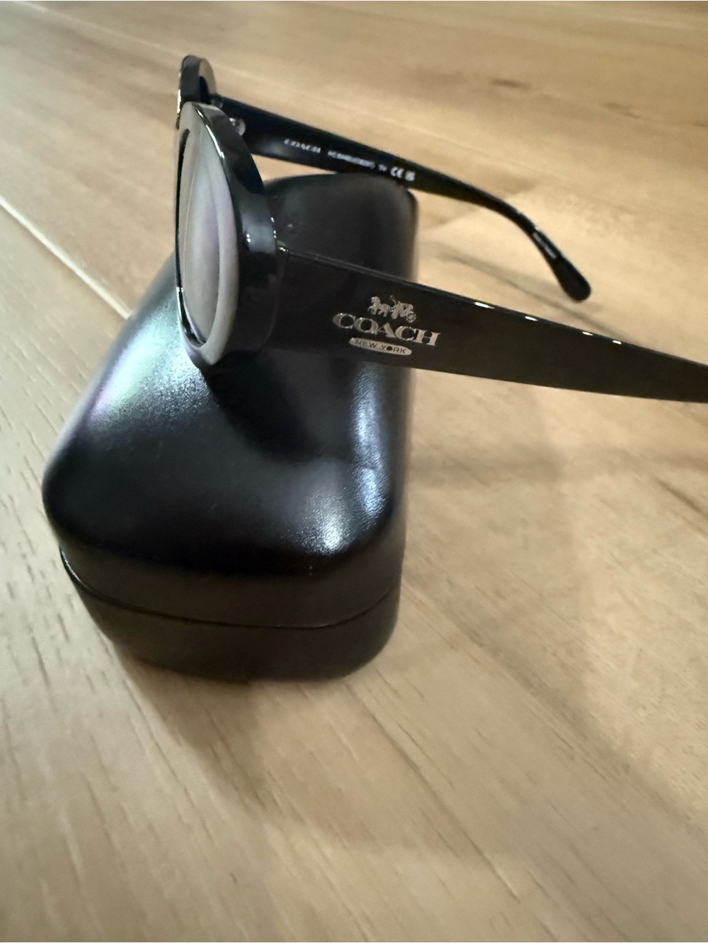Coach Women's Black Oval Sunglasses with Dark Lenses - Picture 8 of 11